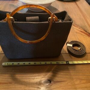Elegant Brown Handbag with Tan Handles